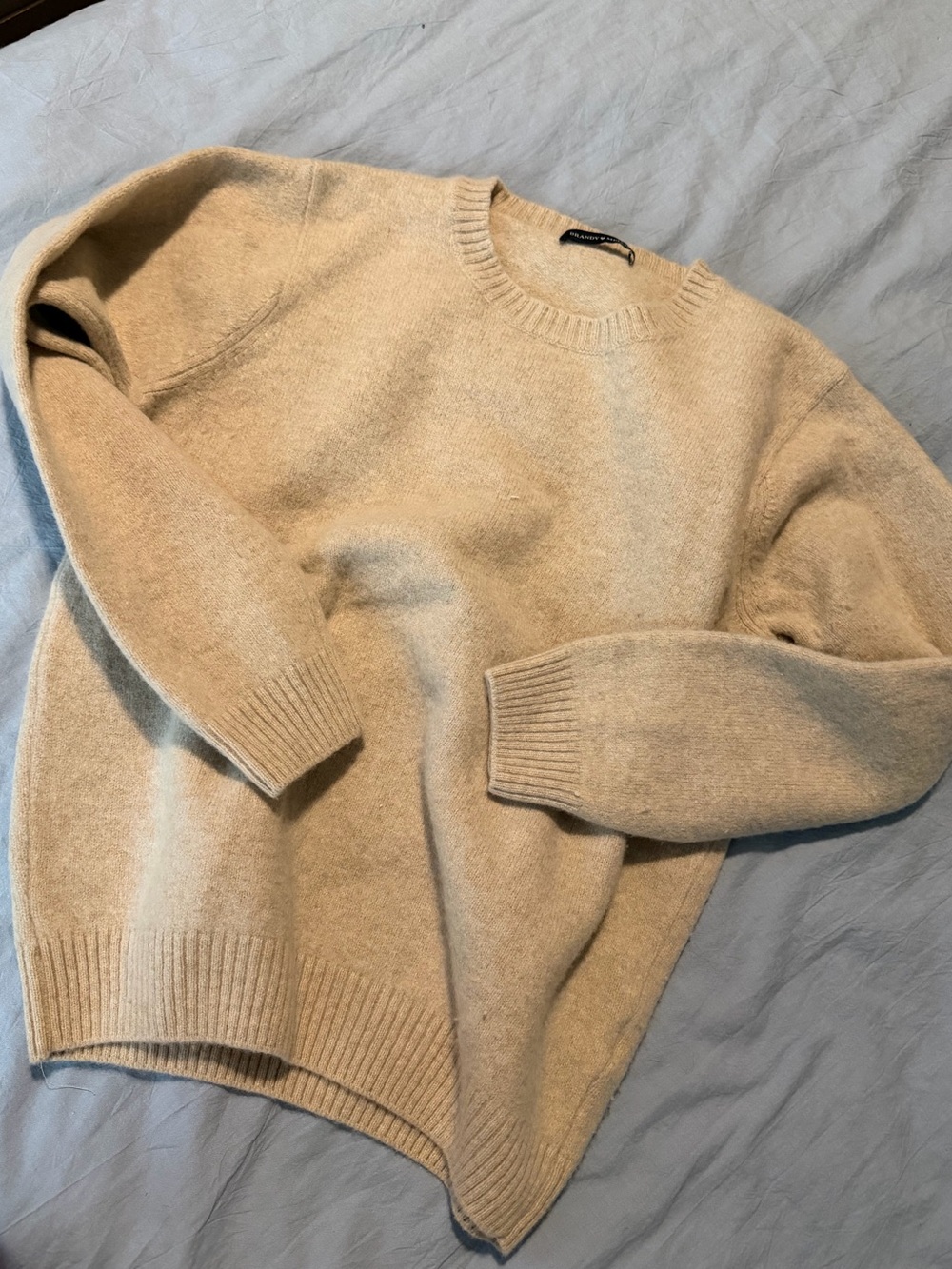 cream brandy melville sweater